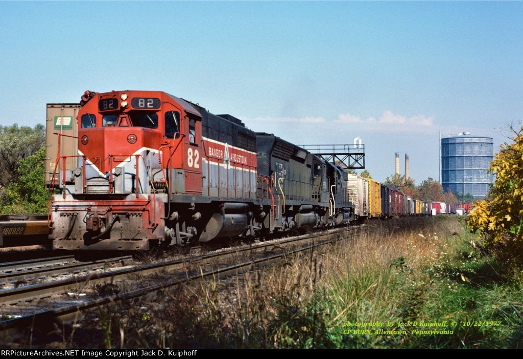 Bangor and Aroostook, BAR GP38 82-Conrail SD45 6156 -GP38-2 8027, with train ABPB-1 on the ex-Reading line at CP Burn, Allentown, Pennsylvania. October 22, 1977. 